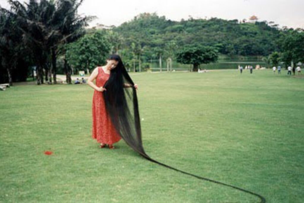 Meet Xie Qiuping; The Woman With The Longest Hair In The World - TRAN ...