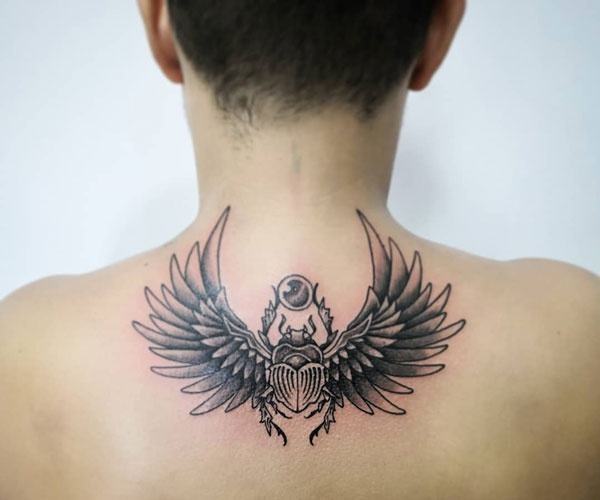 tattoo wings on back of neck 