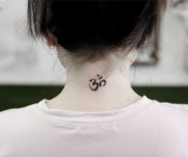 Unique om tattoo on the back of the neck