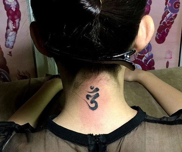 om tattoo on the back of the neck 