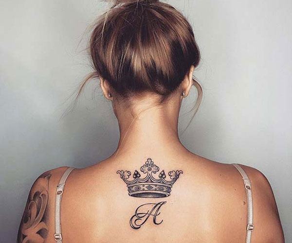 Unique crown tattoo on the back of the neck