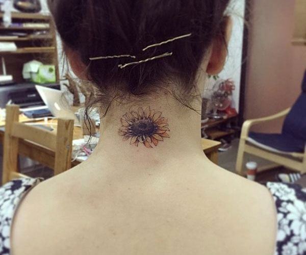 sunflower tattoo on back of neck 